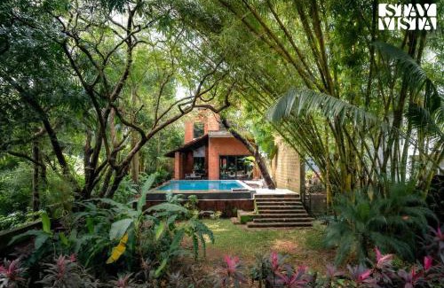 Moira Villa | StayVista at Moira by the River with Bonfire, BBQ