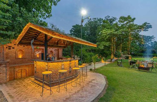 Hoshiarpur Villa | StayVista at Peacocks & Partridges with Amidst Greenery, Terrace, Indoor Fireplace, Bar & Snooker Table