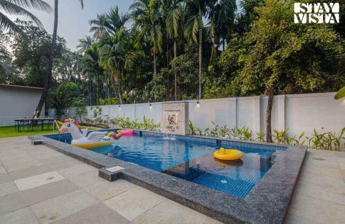 Nagaon Villa | StayVista at Serenity Shores with Pool, Bonfire, Lawn
