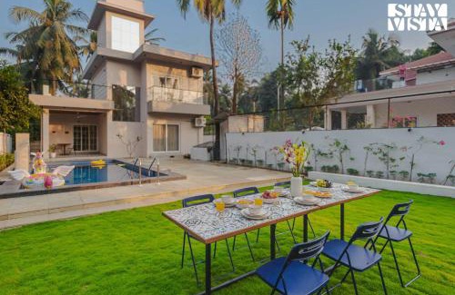 Nagaon Villa | StayVista at Serenity Shores with Pool, Bonfire, Lawn