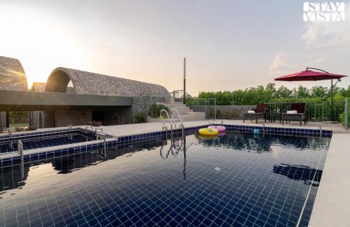 Rajawas Villa | StayVista at The Stone Age Home with Pool, Lawn, BBQ & Bonfire