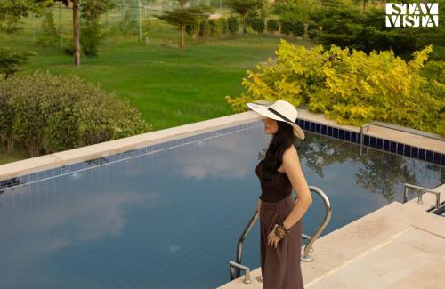 Rajawas Villa | StayVista at The Stone Age Home with Pool, Lawn, BBQ & Bonfire