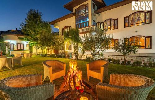 Brein Villa | StayVista at Wooden Arches with Lawn, Jacuzzi & BBQ