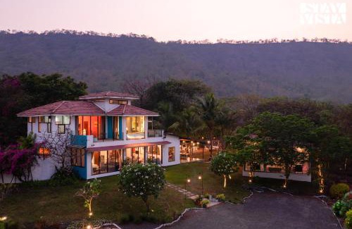 Alibaug Villa | StayVista's House Below The Hill - A stylish Mountain-view villa with Pool and Games room
