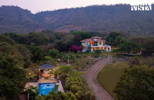 Alibaug Villa | StayVista's House Below The Hill - A stylish Mountain-view villa with Pool and Games room