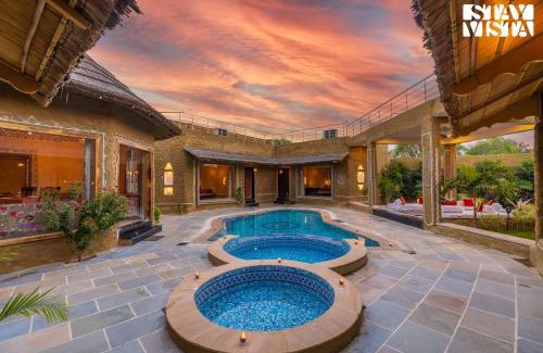Ajmer Villa | StayVista's Majestic Mud House - Rajasthani Architecture with Modern Amenities, Outdoor Pool, Adventure Activities, and Spa