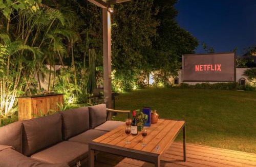 Ludhiana Villa | StayVista's The Secret Lagoon with Outdoor Pool, Verdant Lawn & Indoor-Outdoor Activities