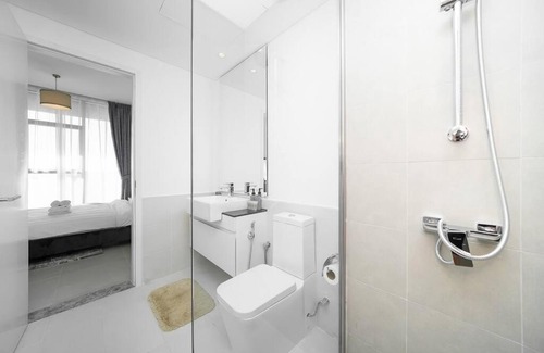 Dubai Investment Park Apartment | StoneTree - Furnished 2BR with floor-to-ceiling window