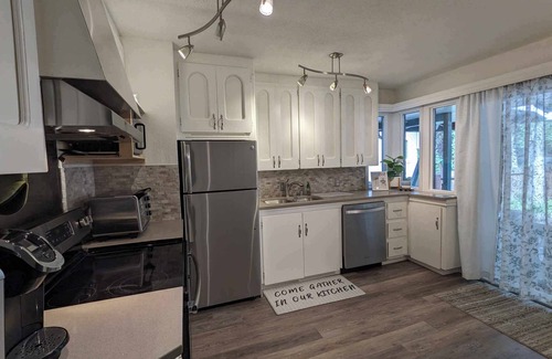 Taku - Campbell House | Stunning creekview home, centrally located. With all the extras.