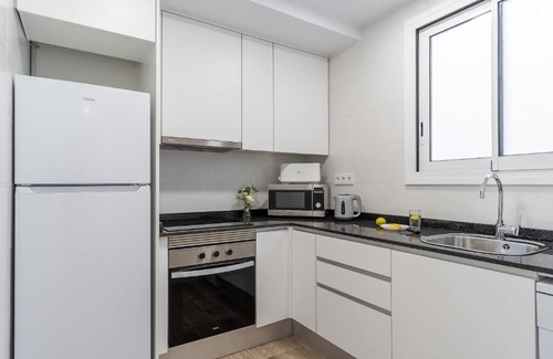 el Fort Pienc Condo | Stunning views over iconic Sagrada Familia! Building perfect for large groups!