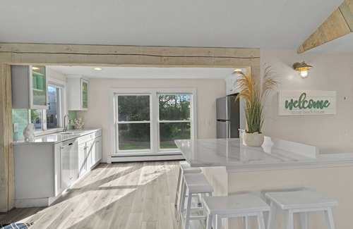 Kenyon Cottage | Stunning waterfront home with big yard & dock! Voted #1 rental in all of RI!