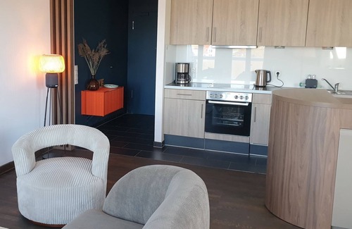 Wremen Apartment | Stylish and spacious penthouse vacation apartment with sauna and North Sea view -