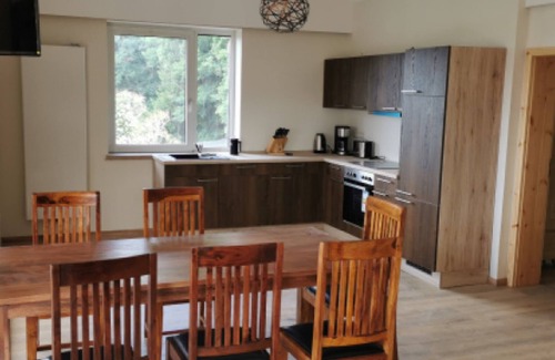 Friedrichsbrunn House | Stylish holiday home with sauna and large garden for groups of up to 9 people.