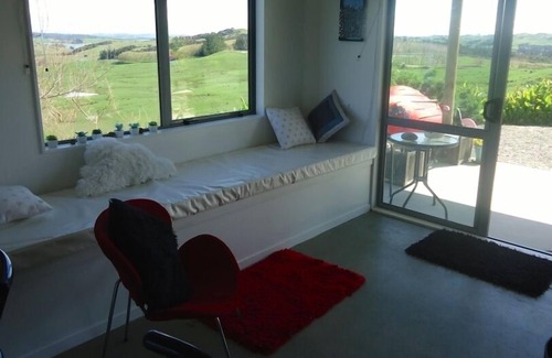 Kaiwaka House | Stylish modern bach with rural and water views