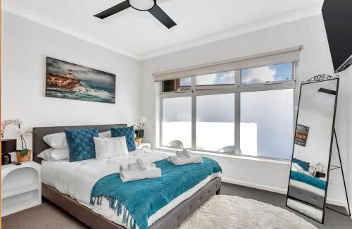 West Beach Apartment | Stylish Seaside Suite with Arcade and Balcony