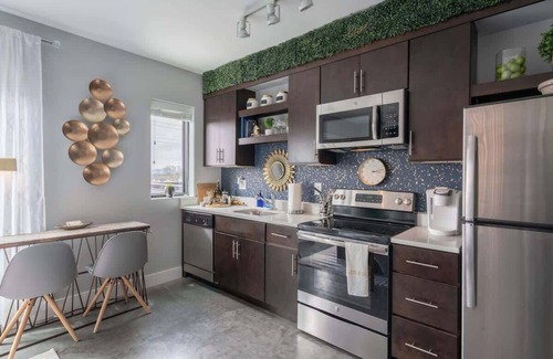 The Nations Apartment | Stylish Studio with Private Deck