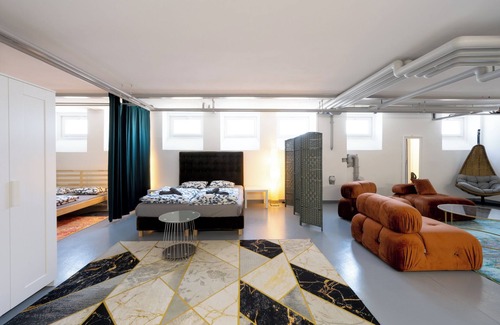 District 4 Apartment | Sunlit Urban Haven: Zurich Loft with 5 Queen Beds