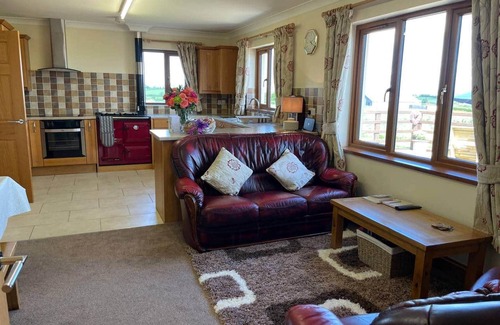 Llangynog Cottage | Sunny Bank, Countryside accessible cottage with hot tub and grassy lawn area