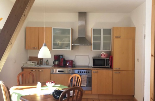 Neuwied Apartment | Sunny, with a 25 m2 renovated, green wooden balcony with a beautiful view.