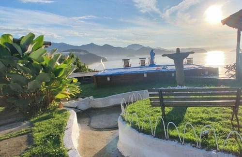 Picinguaba Apartment | Sunrise & Sunset Over Prumirim, puruba Beach, and Porcos Island"