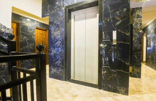 Holy Cross Colony Hotel | Super Hotel O Dabolim Near Goa International Airport