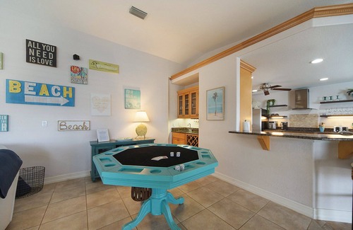 Pelican House | SW CAPE CORAL: 5 BR 4 BA CANAL HOME with BOAT DOCK w/heated/lit pool, jacuzzi