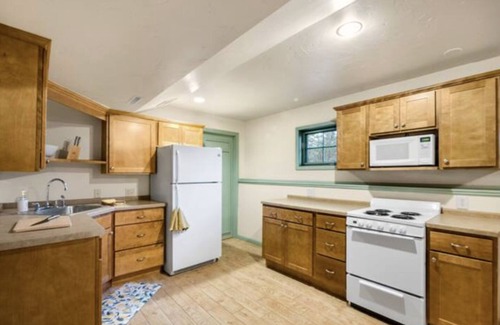 La Crosse House | Swedish Storybook in bluffs hiking trails & stream