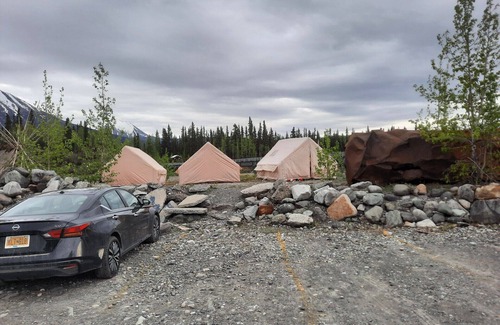 McCarthy RV Rental | Tents at the headwaters of the Kennicott River in marvelous McCarthy with WiFi