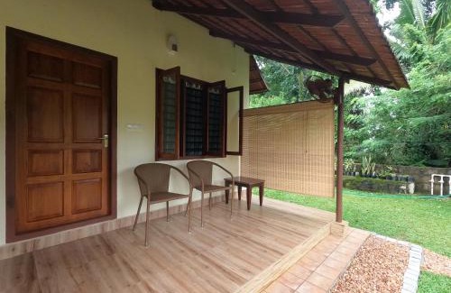 Kumarakom House | Tharangini - Riverside Private Bedroom