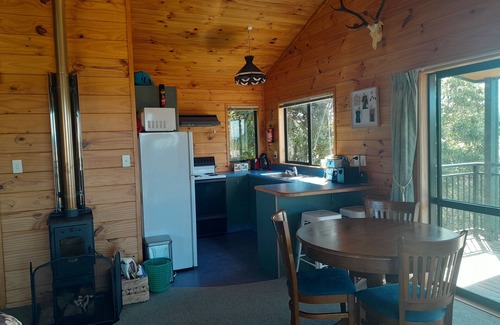 Pokura Pa House | The 8 Point Inn , water views quiet pet friendly cottage