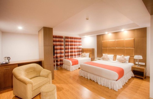 Mysore Hotel | The Atrium Boutique hotel with 1 bedroom and AC, WiFi in charming Mysore