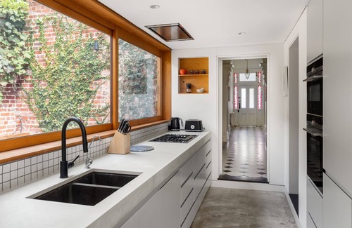 Abbotsford House | The Atrium - Exquisite C1888 home seamlessly merges classic charm with modern design.