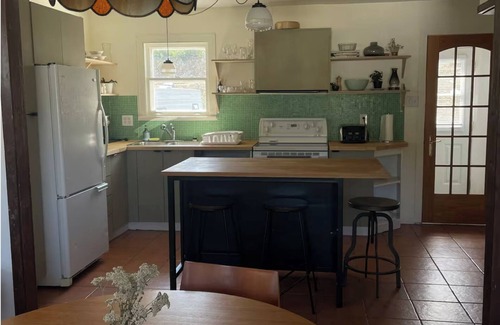 Murdochville House | The blue house at the foot of the mountains