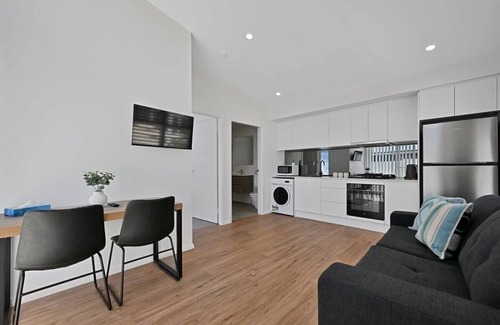 Orange Apartment | The Elm Apartments - The Blue Room