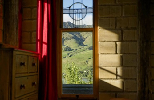 Pigeon Bay Apartment | The Mud House— earth studio in Pigeon Bay with views, wood-fired sauna & bath!
