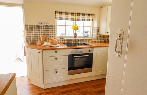 Colwyn Bay Cottage | THE OLD POST OFFICE, pet friendly, with open fire in Old Colwyn