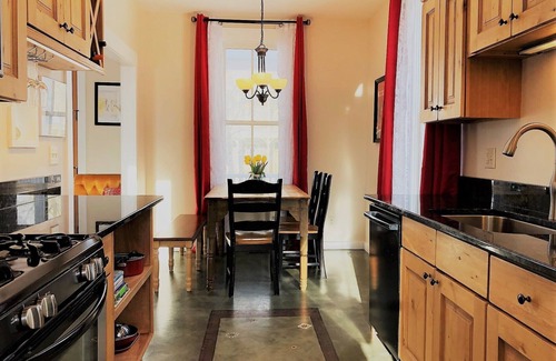 Buena Vista House | The Red Farmhouse at South Main welcomes you! Steps away from the River Trails!