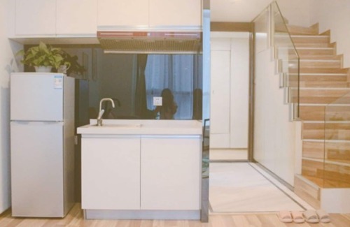 Xinghai Commercial Area Apartment | The Roost Hotel