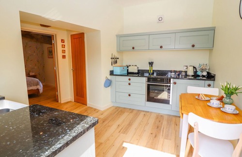 Maesbury Marsh Cottage | THE TRACTOR SHED, pet friendly, character holiday cottage in Oswestry