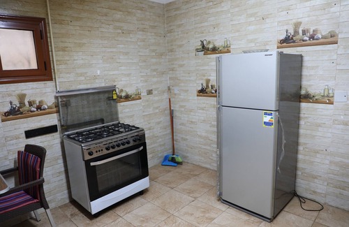 Nasr City Villa | The villa has 3 bedrooms,3 bathrooms,a dining area, and a patio with garden view