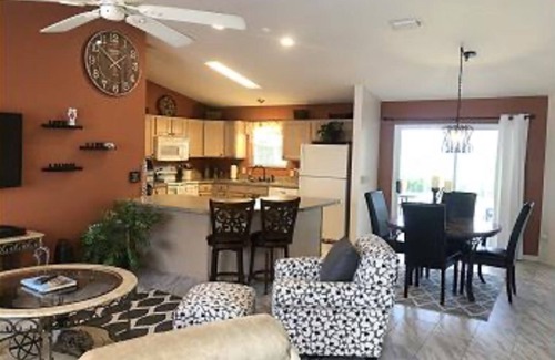 Sanibel House | The Villages FL Community w/Elec. Golf Cart. Restaurants, Shopping & Hospitals.