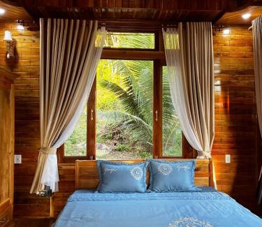 Ham Ninh Ski Chalet | The wooden house has a beautiful sunrise & seaview
