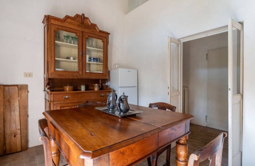 Colorno Apartment | This apartment is located on the top floor of a country villaCharacterized by large spaces including an inviting very bright living room thanks to large windows, a kitchen and a large bedroom accessible via a spiral staircaseAmong the common areas a beau