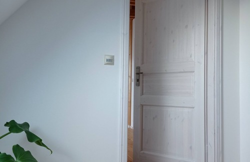 Fuchshain Apartment | Three-sided courtyard étable