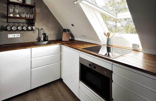 Wittduen Apartment | TIDE4 Amrum No. 6 - Modern apartment with fireplace 100m to the sea, dogs welcome