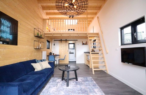Olburgen House | Tiny house with sleeping loft and terrace