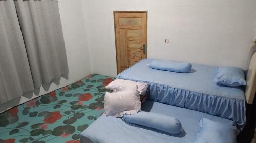 Ambarita House | Toba Breeze