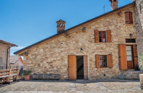 Ca' de' Grimaldi House | Tranquil Village Stay with Fireplace
