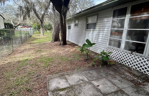 North Forest Hills House | Travelers Abode- Large fully fenced in yard & peaceful neighborhood