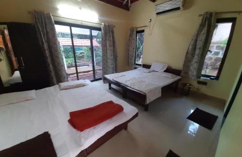 Dapoli Bed & Breakfast | Triskelion - Bed and Breakfast, Family home stay by Joshi Brothers